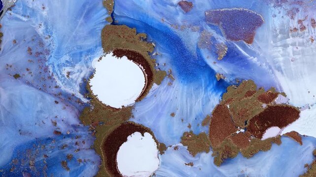 Mixing different colored alcohol inks with epoxy resin close-up