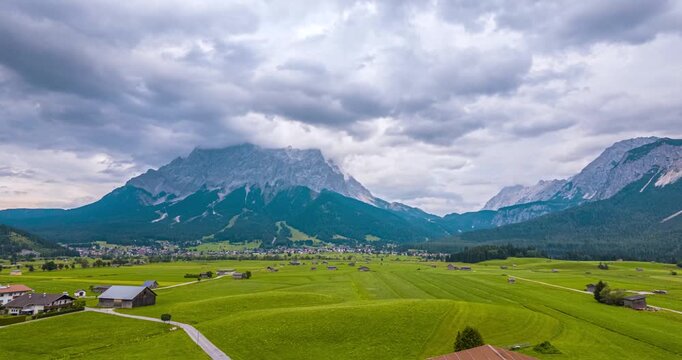 Zugspitze timelapse from Lermoos with fields and moving clouds