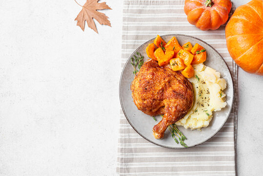 Autumn meal: roasted chicken with pumpkin and mashed potato