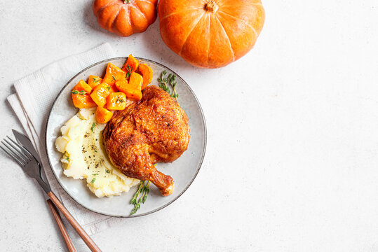 Autumn meal: roasted chicken with glazed pumpkin and mashed potato