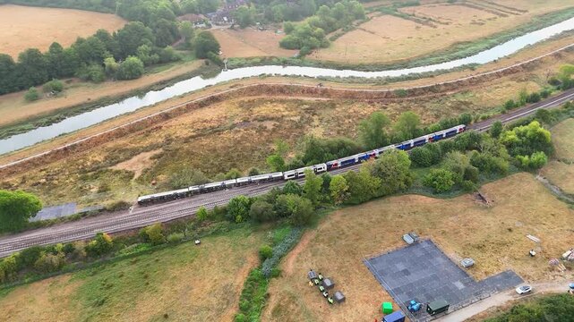 Aerial view of a Southern passenger train after three carriages derailed and overturned between Haywards Heath and Lewes. East Sussex, United Kingdom.