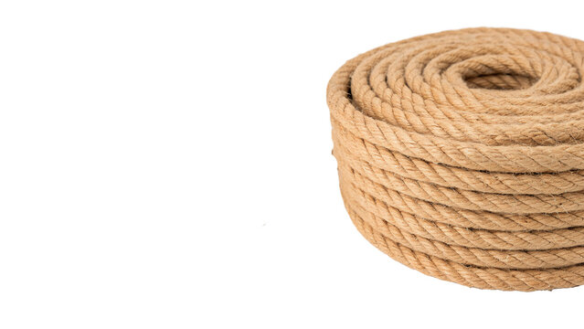 A neat coil of thick natural brown jute rope isolated on transparent background.