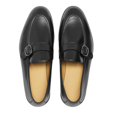 Pair of black leather monk strap loafers with metal buckles viewed from above