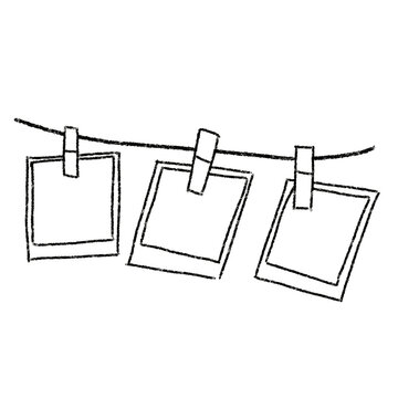 Three blank Polaroid photos hang from a clothesline with clothespins. Simple black-and-white sketch style.