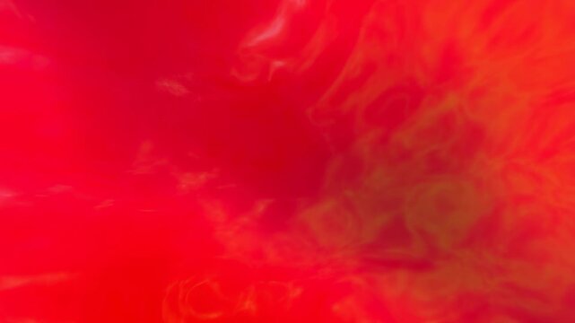 Abstract red and orange fluid smoke or ink diffuses and swirls across the frame. Energy animation combines diffusion with expanding particle motion.