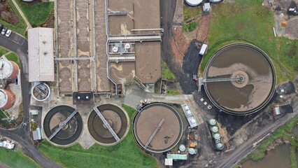 Wastewater treatment plant processing sewage top down © GoAerials