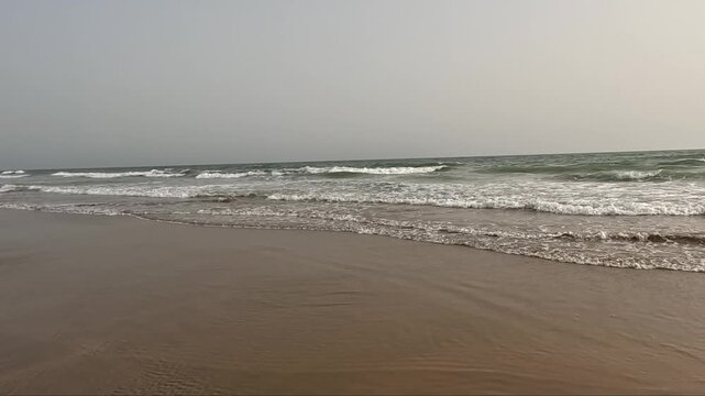 waves rolling on the beach