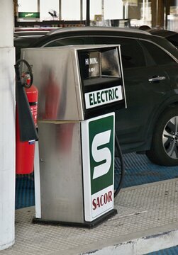 Electric charging station with Sacor branding and fire extinguisher