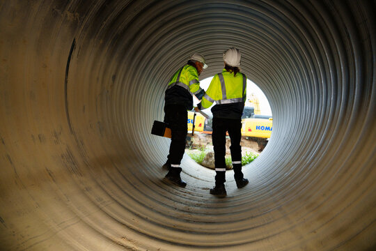 Industrial engineers who inspect large utility pipes inside or in tunnels used for water systems.