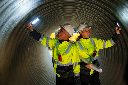 Industrial engineers who inspect large utility pipes inside or in tunnels used for water systems.