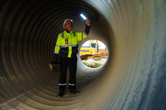 Industrial engineers who inspect large utility pipes inside or in tunnels used for water systems.