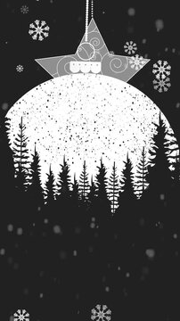 Snowflakes falling over christmas bauble decoration hanging against black background