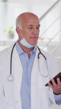 Holding tablet, doctor with stethoscope and mask, network connections animation