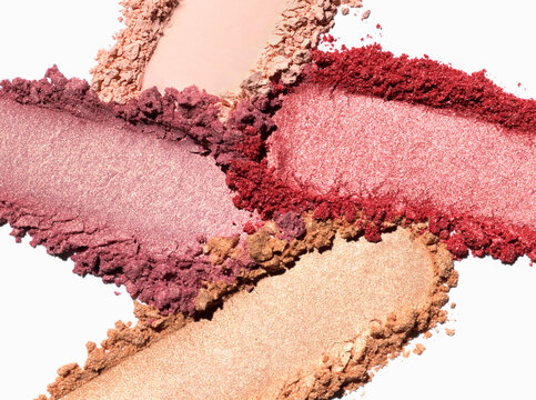 Composition of eye shadow swatches on white background. Eyeshadow product sample texture