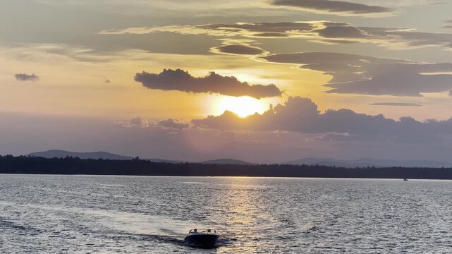 Motor Boating at Sunset