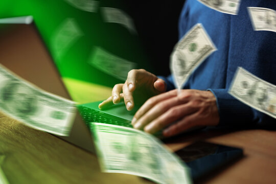 Sport bet involves using a computer to place bets while money flies around in the air during an online betting event