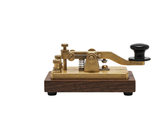 Vintage brass telegraph key on wooden base