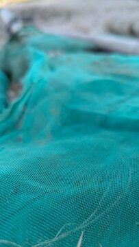 Close Up Of Green Fishing Net Mesh Fabric Texture