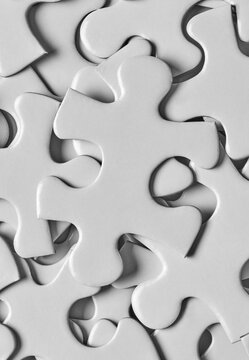 White puzzle pieces close up