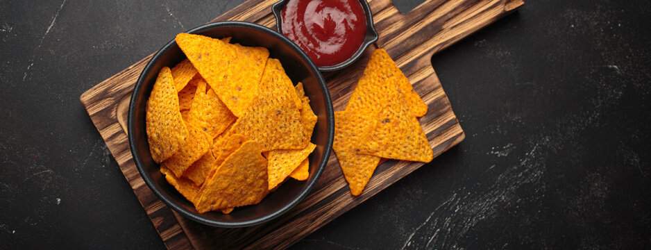 Nachos tortilla chips salsa dip wooden board Mexican Tex-Mex snack fast food