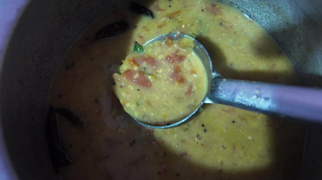 lentil curry , super close up slow motion , south India moong dal curry