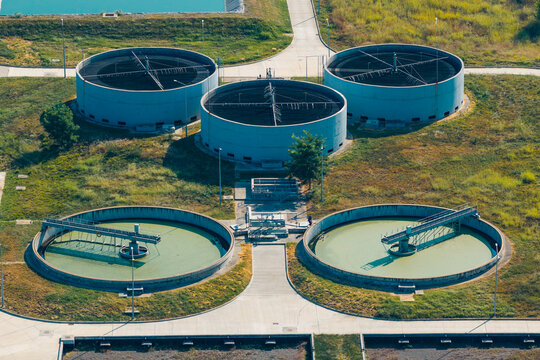 Aerial view of the Telavi Waste Water Treatment Facility featuring large circular sedimentation tanks and water purification infrastructure in Kondoli, Kakheti, Georgia.