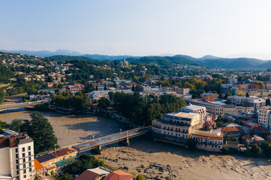 Aerial view of the Rioni River, the White Bridge, and the historic Bagrati Cathedral overlooking the urban landscape of Kutaisi, Imereti, Georgia.