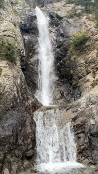 The Manas Cup Waterfall  natural landmark in the Barskoon Gorge on the southern shore of Lake Issyk-Kul in Kyrgyzstan.