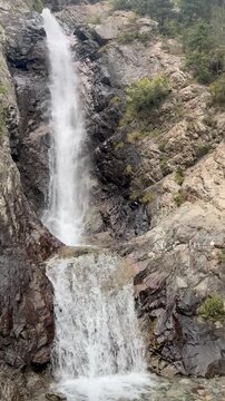 The Manas Cup Waterfall  natural landmark in the Barskoon Gorge on the southern shore of Lake Issyk-Kul in Kyrgyzstan.