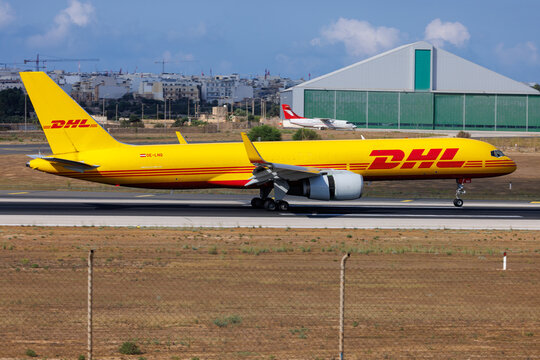 Luqa, Malta - August 21, 2026: DHL Air Austria Boeing 757-223(PCF) (REG: OE-LNQ) arriving from Milan as flight number QY7922.