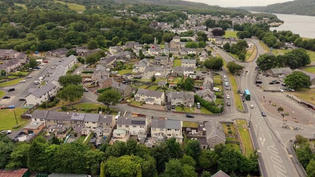 Aerial Video Llanberis Wales. Llanberis  is a village, community and electoral division in Gwynedd, northwest Wales, on the southern shore of Llyn Padarn and at the foot of Snowdon.