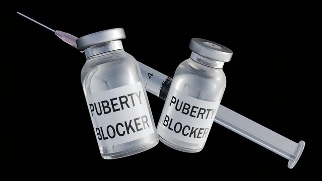 A 3d syringe paired with a labeled puberty blocker vial. A representation of injectable hormone therapy, clinical administration, and pediatric endocrinology.