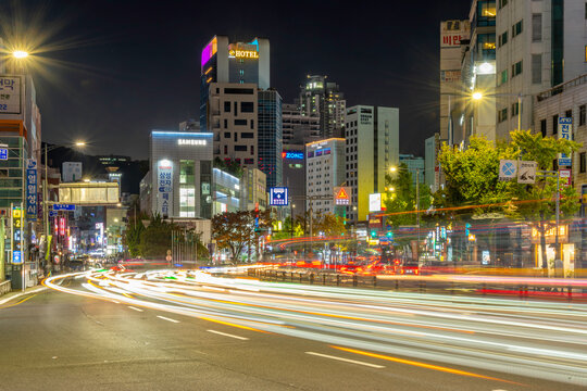 View of city skyline and trail lights near Jagalchi Market at dusk, Jung-gu, Bupyeong-dong, Busan, South Korea
