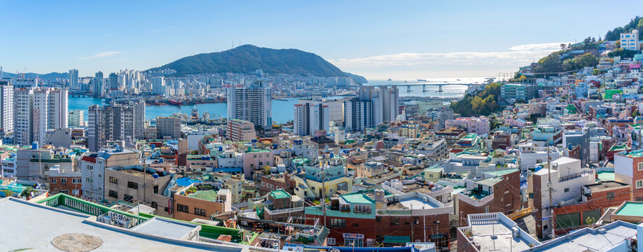 View of city landscape and colourful rooftops and houses of Nambumin-dong District on a sunny day, Seo-gu, Busan, South Korea