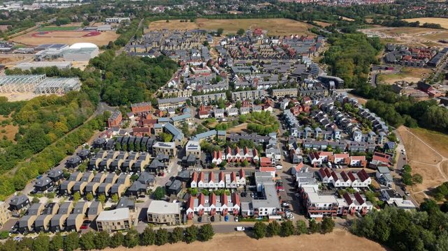 Aerial view of modern architectural residential housing estate and geometric rooftops in Harlow Essex UK