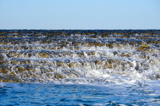 Rushing water at Montgomery Reef, a reef off the Kimberley, Yawajaba Island, Australia