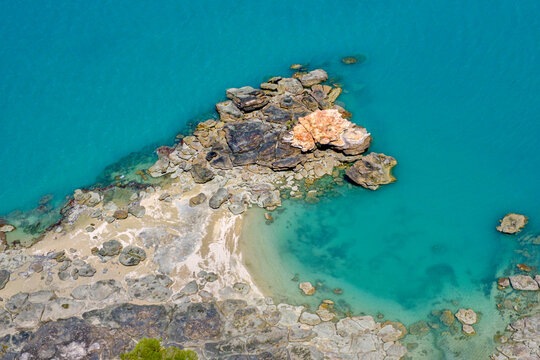 View of Swift Bay with its clear waters and rocky shores along the North Kimberley coast in Australia