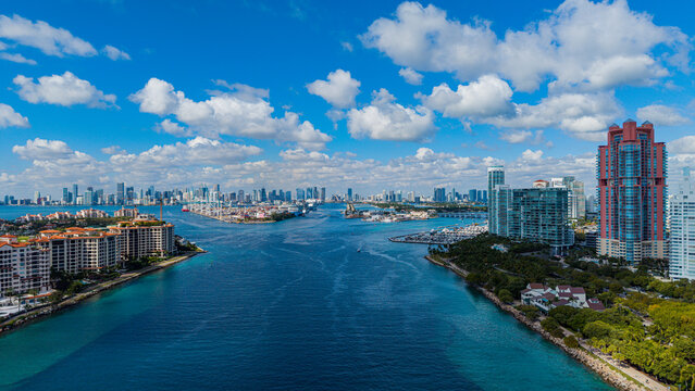 View of waterway and cityscape near South Beach in Miami, Florida with boats and buildings in the background