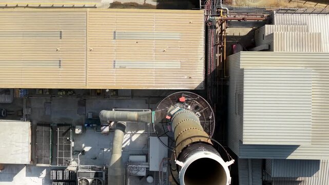 Close Up Aerial View of Industrial Chimney Smoke Stack with Heat Haze and Emissions in Harlow UK