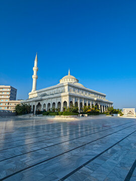 Construction and architecture of Ali Jimale Mosque in Mogadishu located in Somalia with a clear blue sky overhead