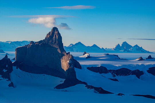 Mountain tops peeking out of the glaciers of Queen Maud Land, Antarctica
