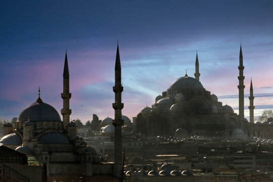 Stunning view of domes and minarets as the sun sets over a historic city in Turkey