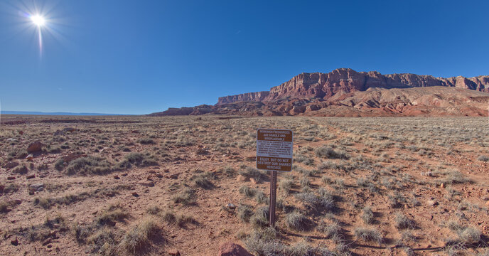 Sign encourages photography while reminding visitors not to remove objects at Vermilion Cliffs National Monument in Arizona, USA