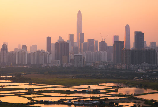 View of Shenzhen skyline from Former Macintosh Fort hill at sunset near the border with Hong Kong