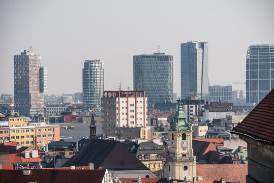 Bratislava cityscape with red rooftops and modern buildings in the background