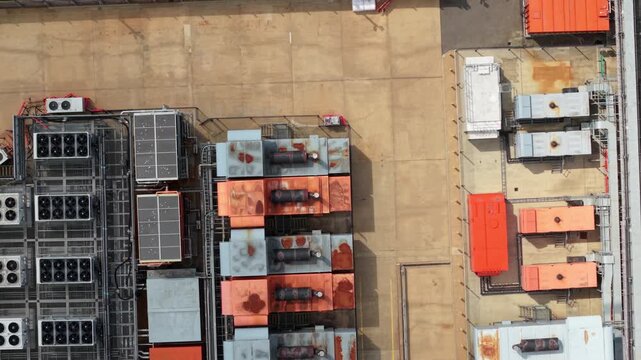 Aerial view of data center chiller units external cooling fans and HVAC mechanical infrastructure UK