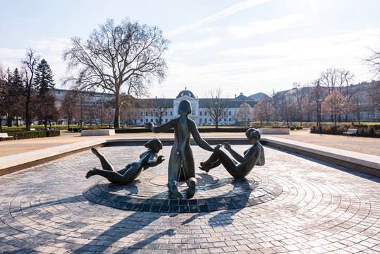Playful bronze sculptures at the Fairy Tale Fountain in Medick zhrada park on a sunny day in Bratislava