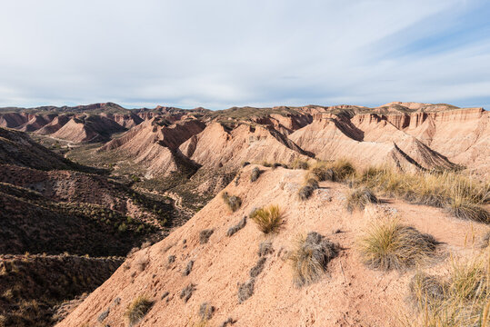 Dramatic view of gullies and ridges in Guadix Basins Badlands of Purullena Spain during soft light