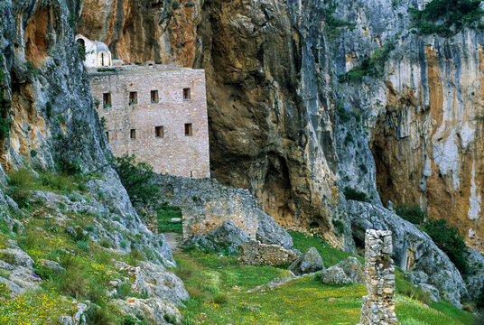Monastery set against rocky landscape near Pelei village in Argolid, Peloponnese, Greece