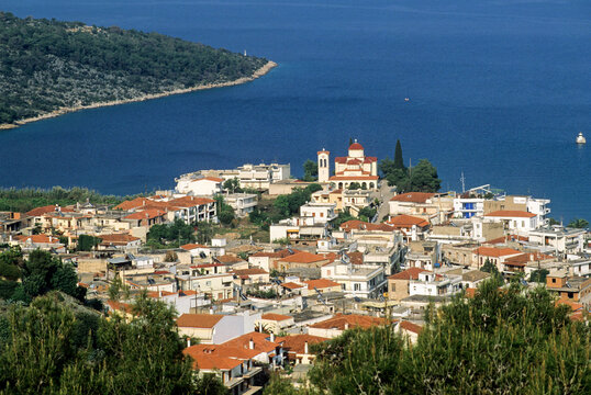 View of Palaia Epidavros village with buildings near the sea in Greece during daytime